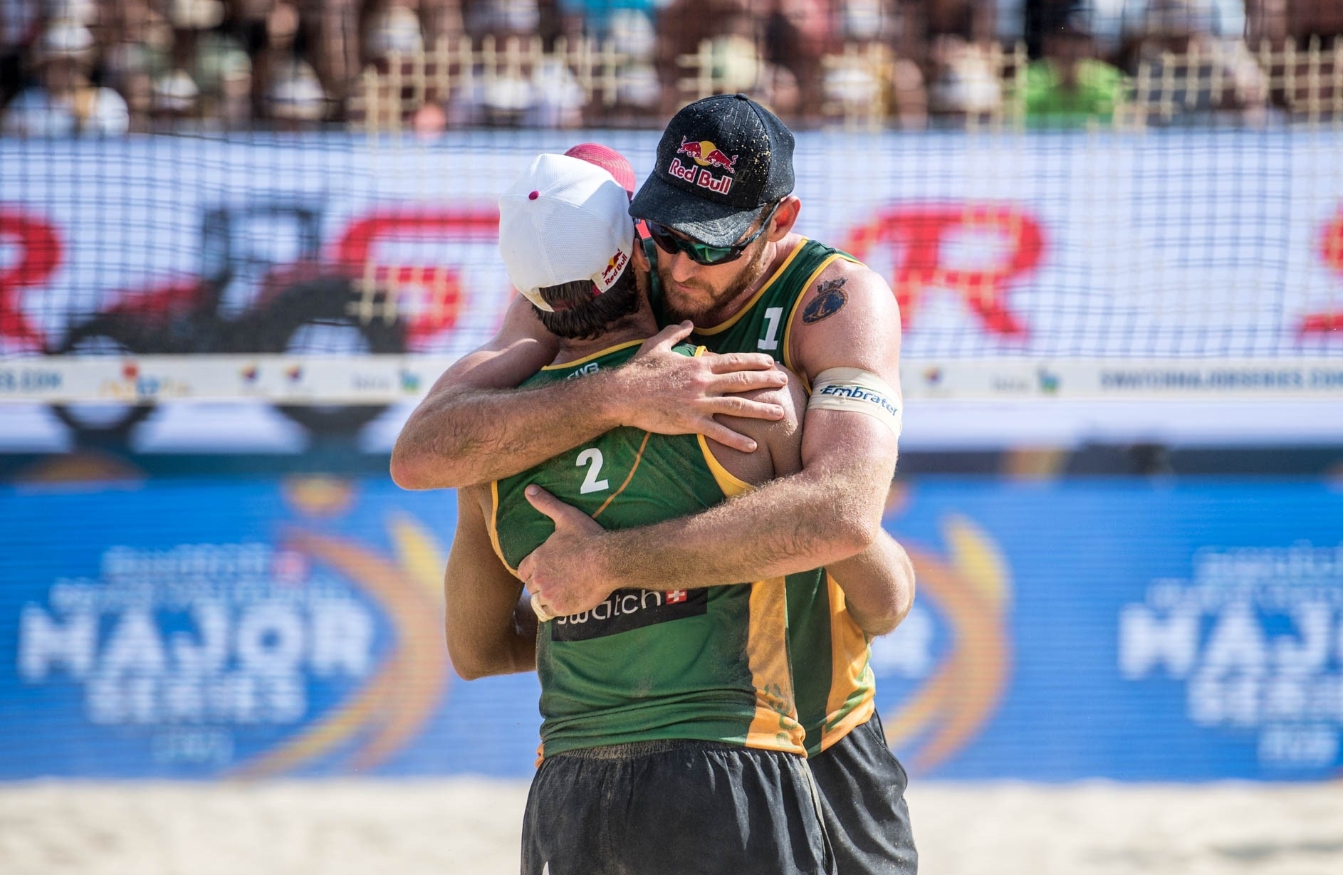 Alison/Bruno hug it out after their incredible victory. Photocredit: Pedrag Vuckovic.